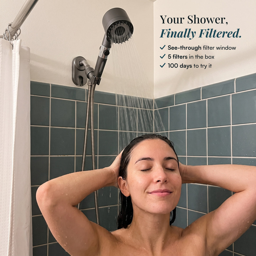 Woman enjoying a filtered shower with the CONNECT shower head